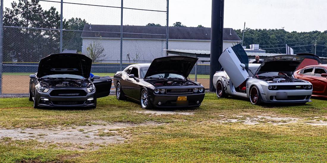 Mustang and Challengers with hoods up